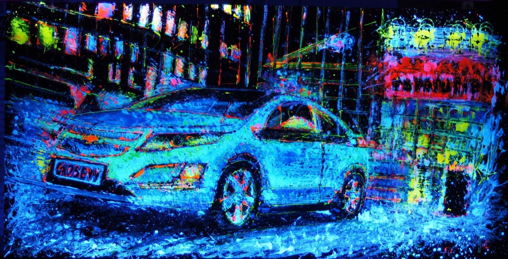 Puro estilo: Chevrolet se luce con pintura fluorescente del Volt, realizada con autos a control remoto